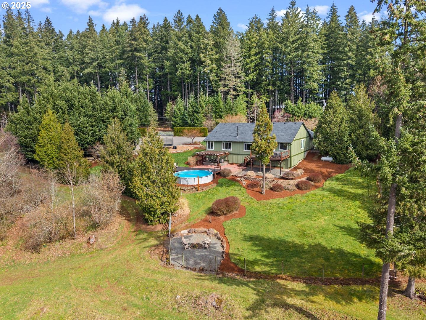 21481 South Ridge Road Oregon City, OR 97045 - Photo 41 of 48 a view of a lake with a house