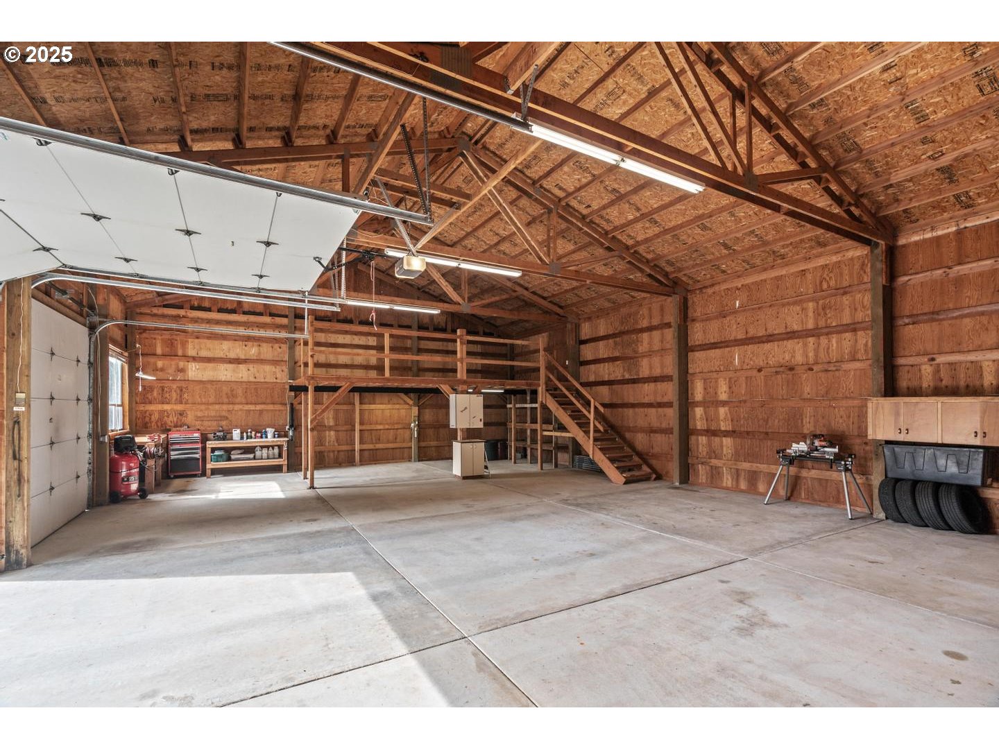 21481 South Ridge Road Oregon City, OR 97045 - Photo 46 of 48 a view of a big room with wooden walls
