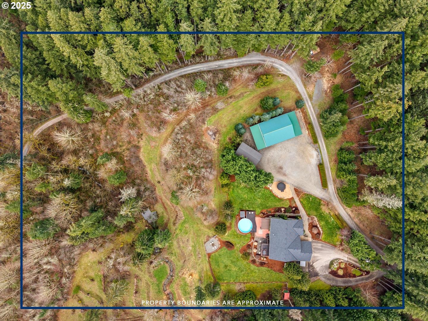 21481 South Ridge Road Oregon City, OR 97045 - Photo 48 of 48 an aerial view of a house with a yard and large trees