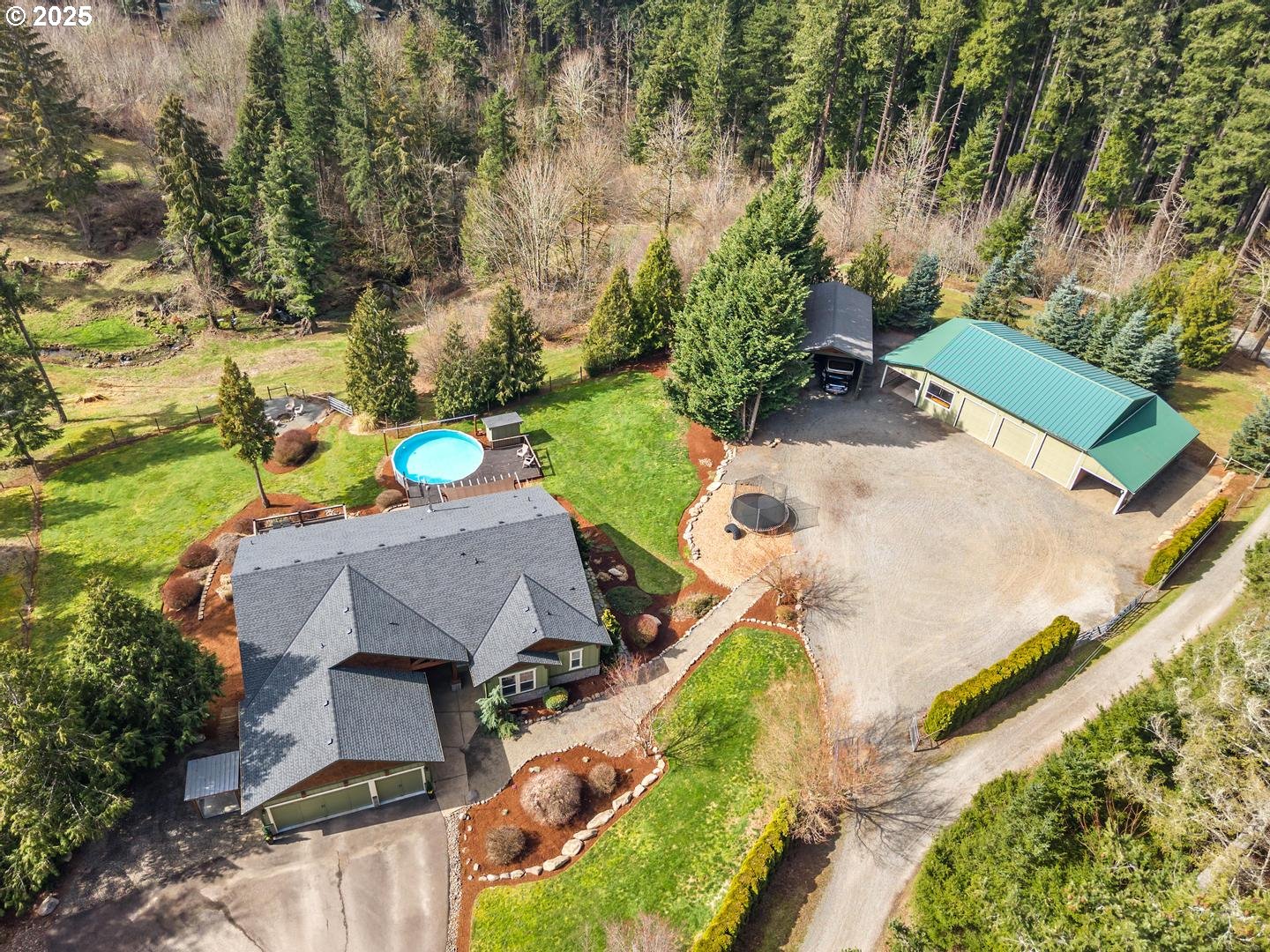 21481 South Ridge Road Oregon City, OR 97045 - Photo 6 of 48 an aerial view of a house with a yard and lake view
