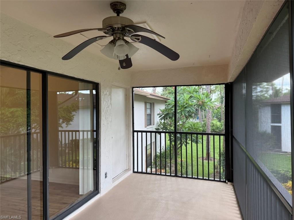 1801 Courtyard Way, Unit D201 Naples, FL 34112 - Photo 27 of 37 a view of a balcony