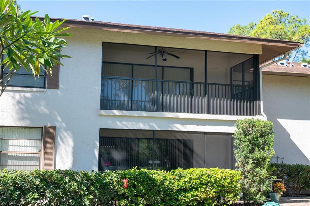 1801 Courtyard Way, Unit D201 Naples, FL 34112 - Photo 36 of 37 a view of small garden area with a small yard