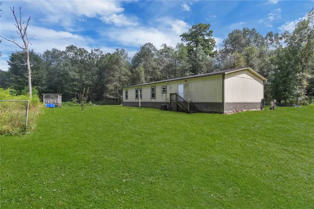 a view of a backyard with a garden