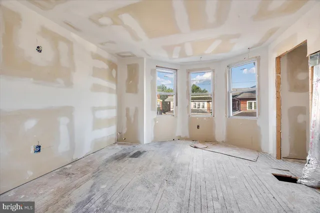 an empty room with windows