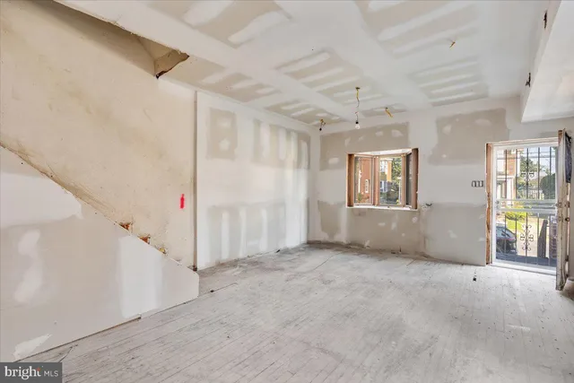 an empty room with windows