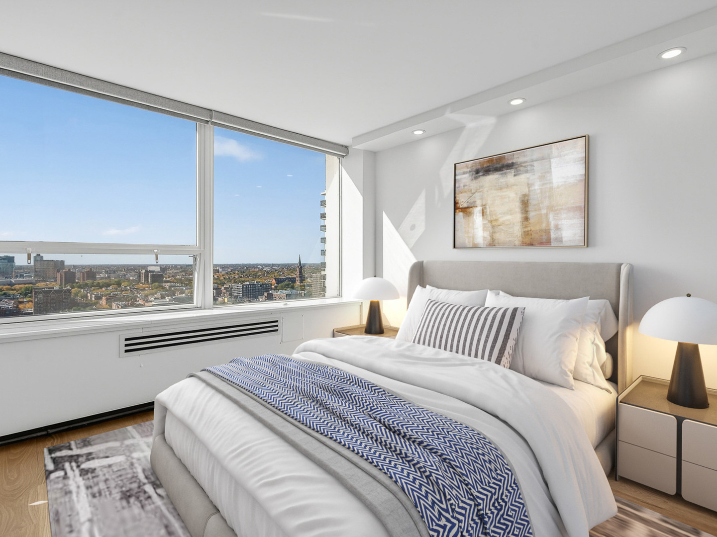 1455 North Sandburg Terrace, Unit 2403 Chicago, IL 60610 - Photo 10 of 22 a bedroom with a large bed and a large window