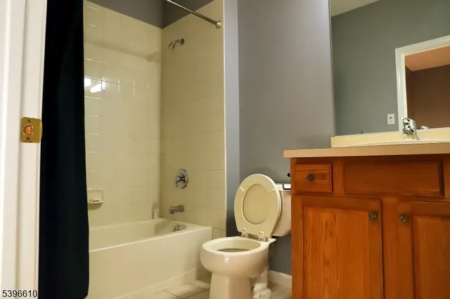 a view of a bathroom from a hallway