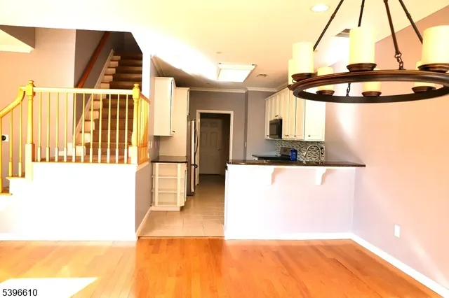 a view of kitchen and dining area with furniture