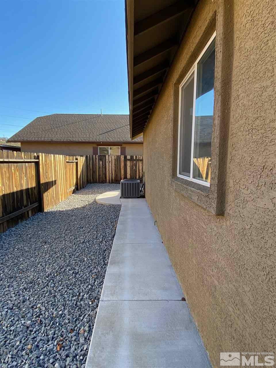 1375 Copper Leaf Drive Reno, NV 89506 - Photo 15 of 20 a view of a house with a backyard