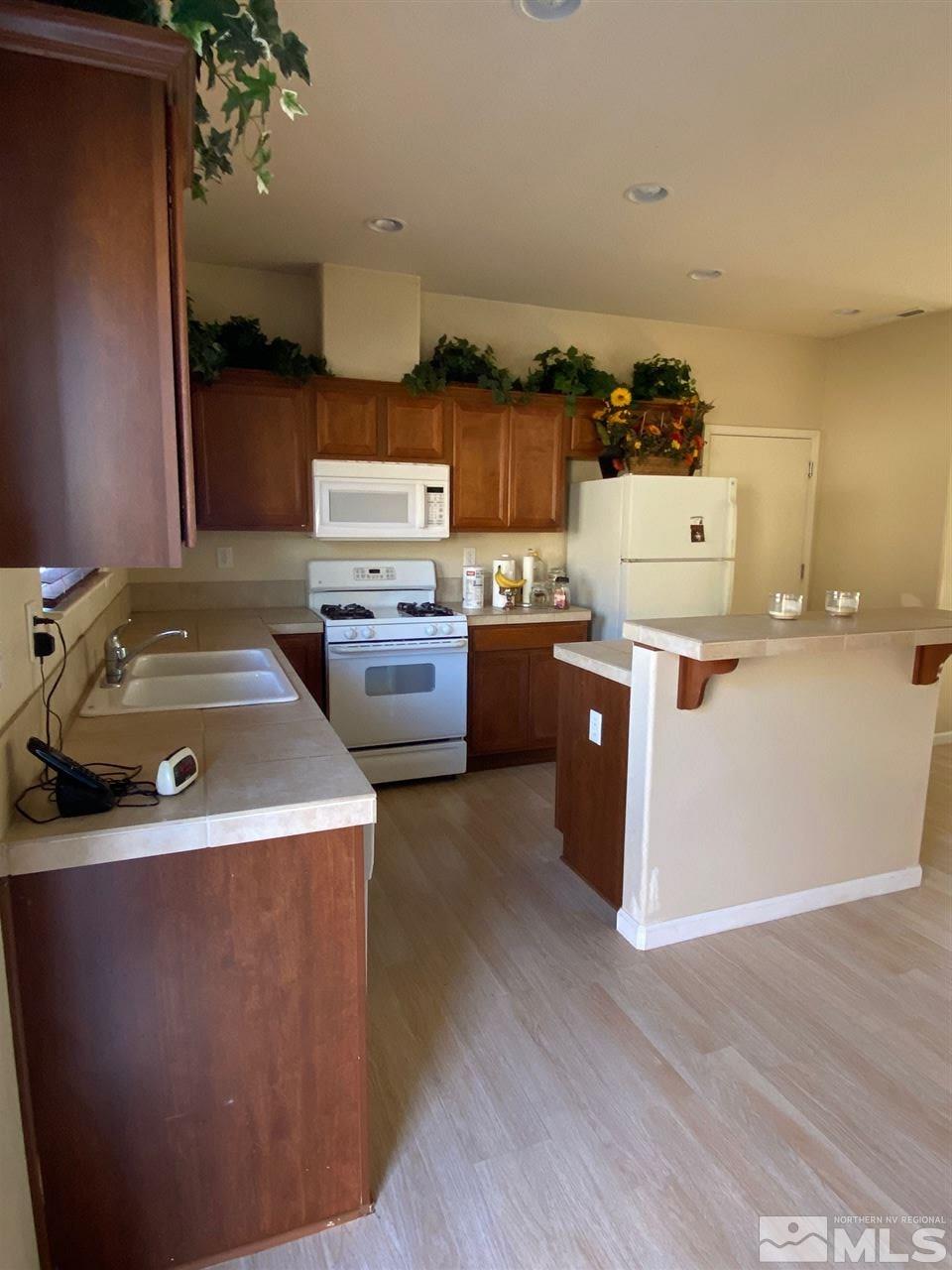 1375 Copper Leaf Drive Reno, NV 89506 - Photo 6 of 20 a room with storage and utility