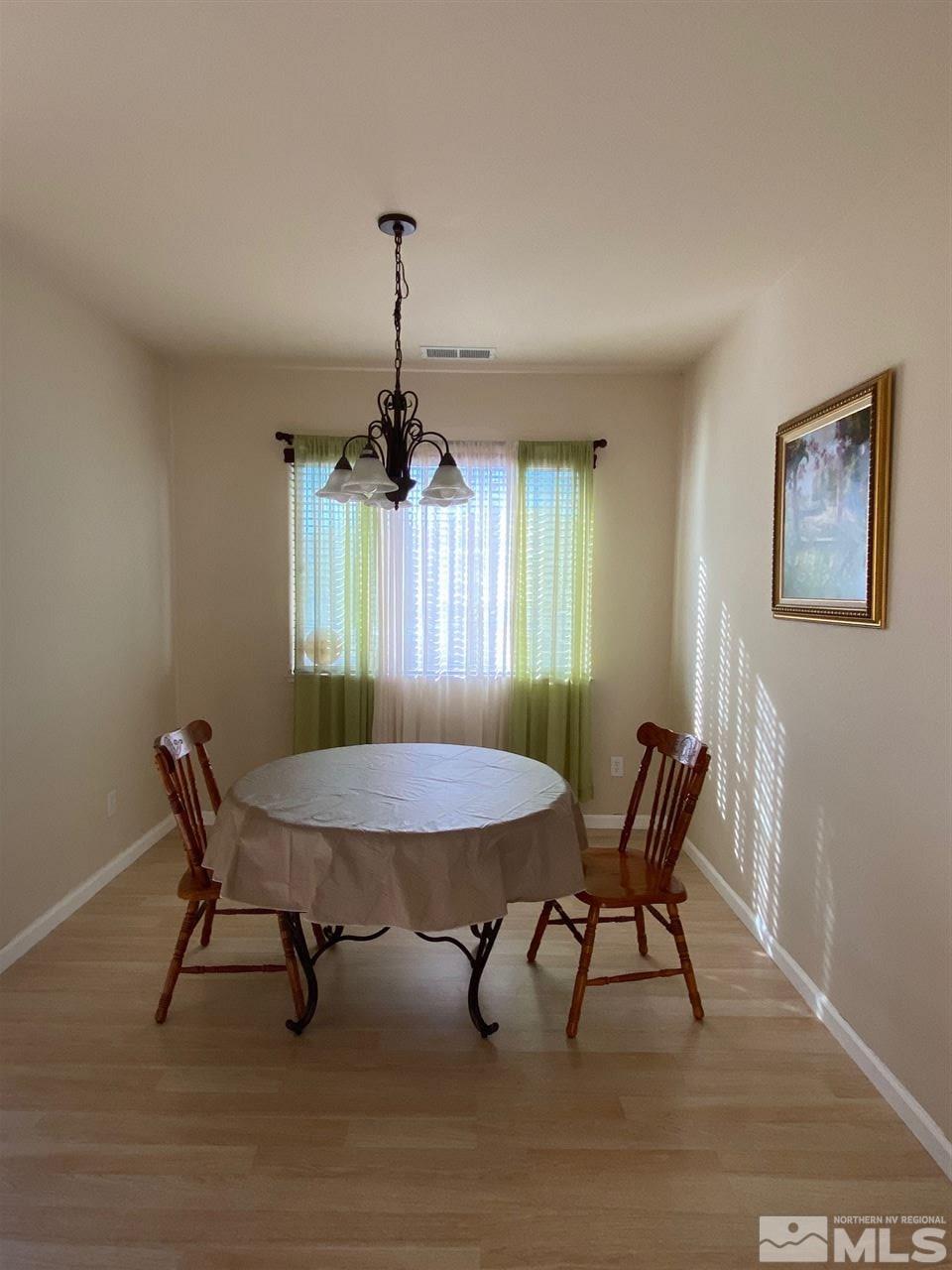 1375 Copper Leaf Drive Reno, NV 89506 - Photo 7 of 20 a view of a dining room with furniture