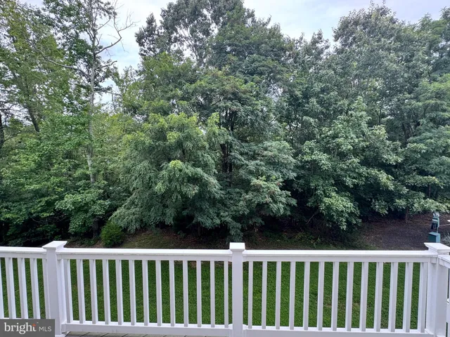 a view of a wooden fence