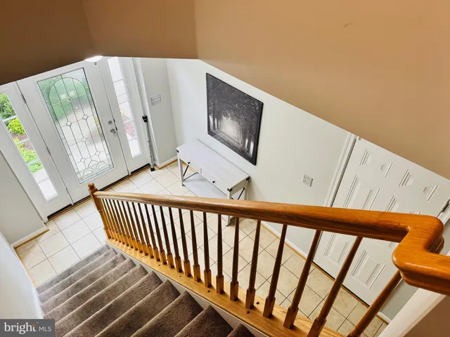 a view of a hallway with staircase