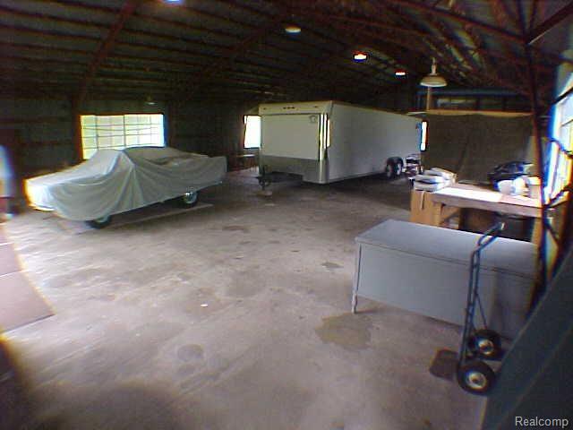 2855 East Coon Lake Road Howell, MI 48843 - Photo 8 of 9 Shed interior