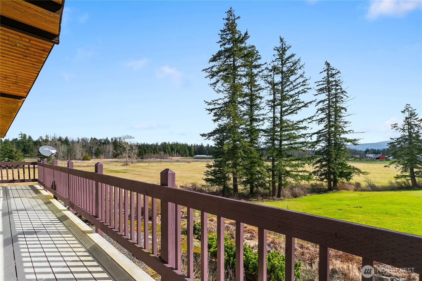 626 Van Wyck Road Bellingham, WA 98226 - Photo 1 of 40 a view of a lake from a balcony