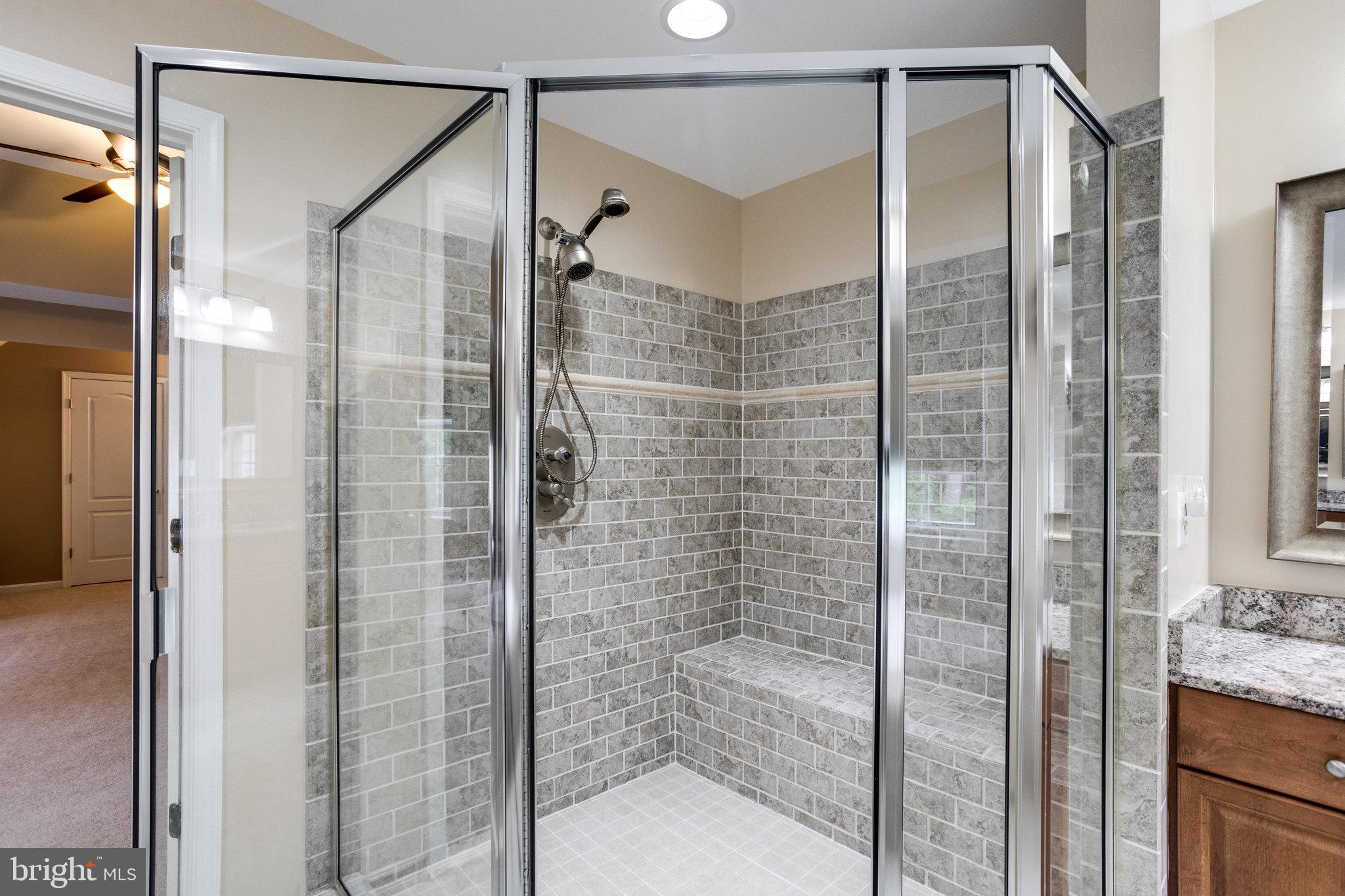 13195 Delaney Road Woodbridge, VA 22193 - Photo 50 of 88 Primary Bath stand up shower w/ bench seat