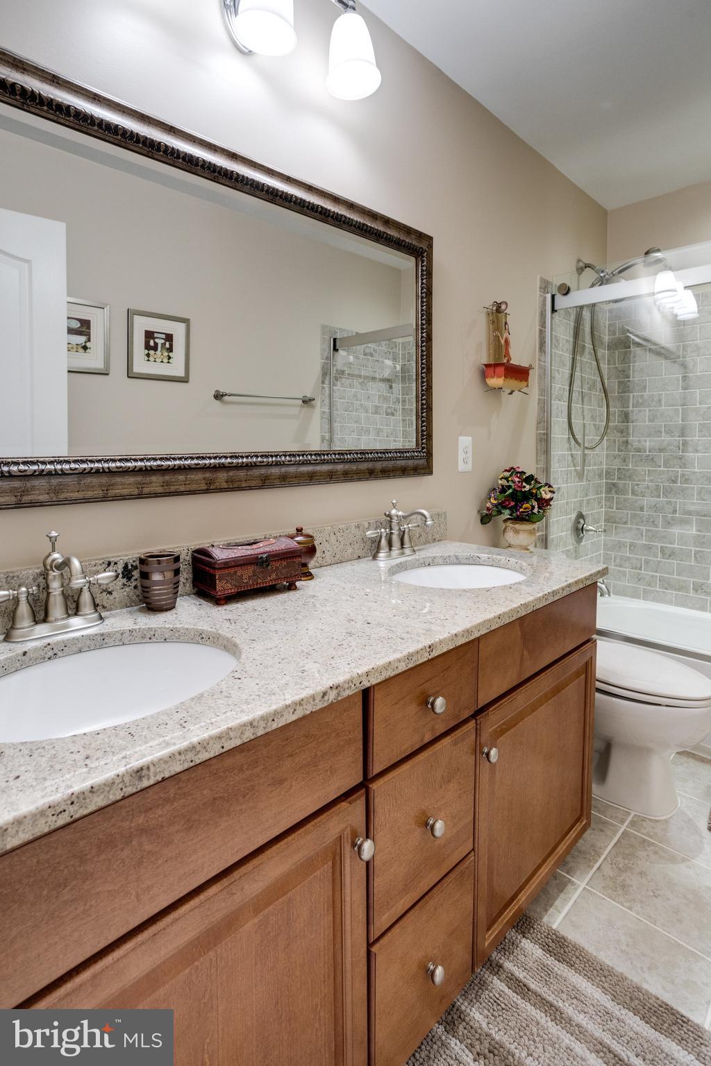 13195 Delaney Road Woodbridge, VA 22193 - Photo 61 of 88 Upper Level Hall Bath w/ dual sinks & granite