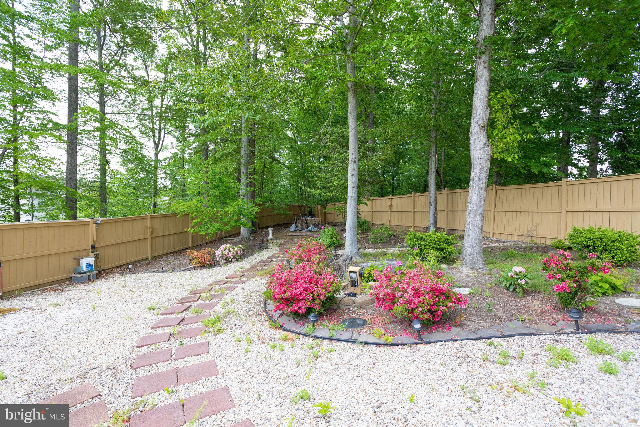 13195 Delaney Road Woodbridge, VA 22193 - Photo 88 of 88 Beautiful landscaping in the back yard