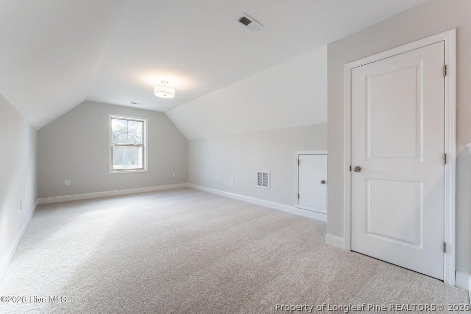 229 Telluride Court Aberdeen, NC 28315 - Photo 17 of 19 a view of empty room with windows