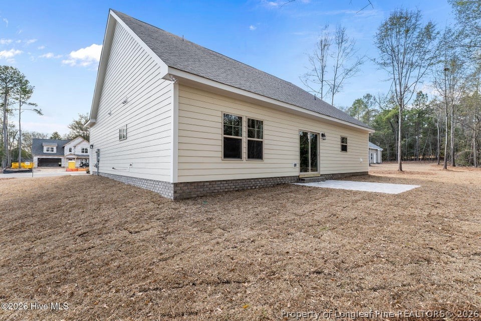 229 Telluride Court Aberdeen, NC 28315 - Photo 19 of 19 a view of a house with a backyard