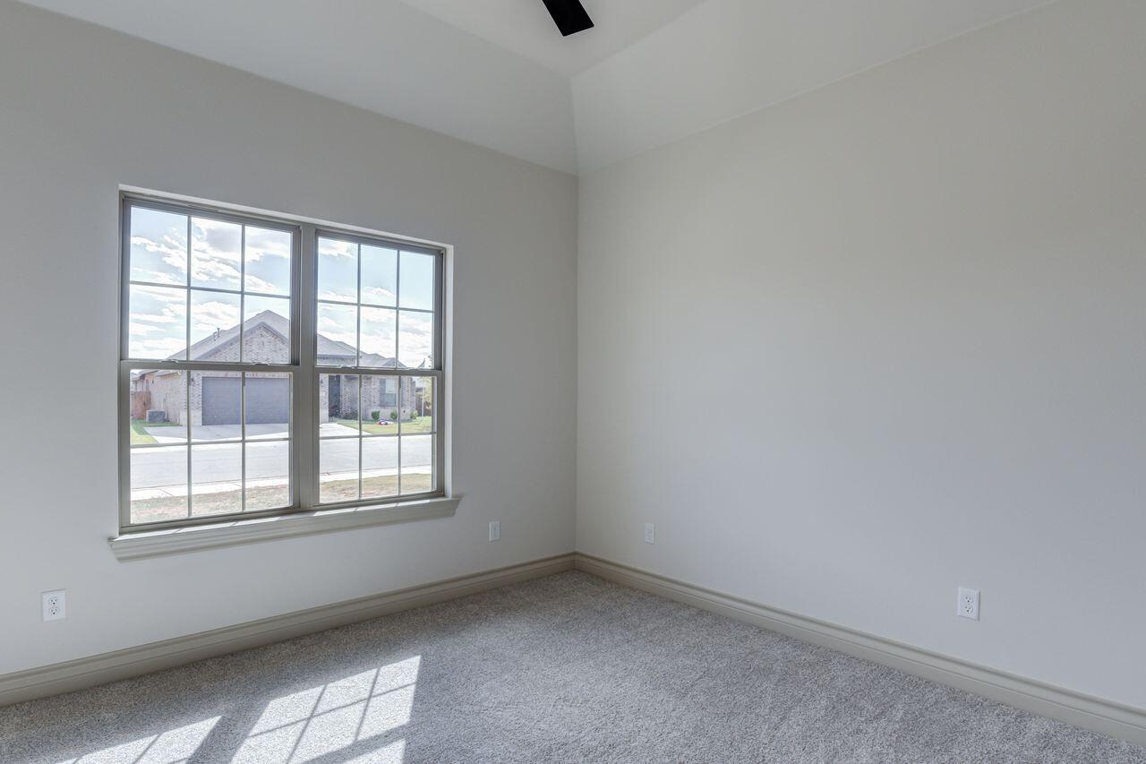 5524 120th Street Lubbock, TX 79424 - Photo 27 of 39 an empty room with a window