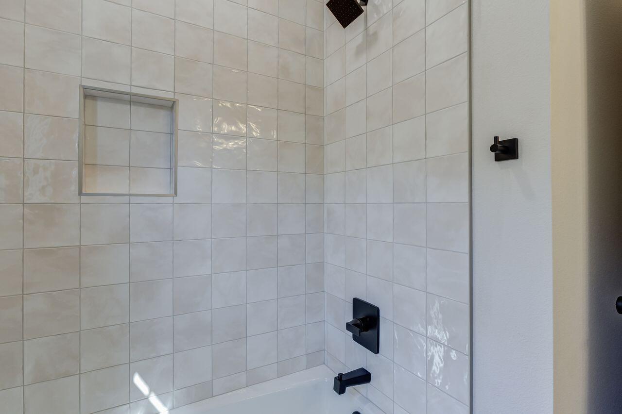 5524 120th Street Lubbock, TX 79424 - Photo 29 of 39 a bathroom with a shower