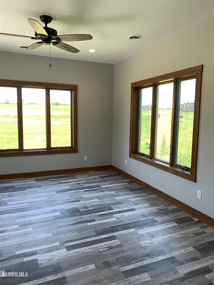 407 Oak Ridge Drive Lena, IL 61048 - Photo 22 of 50 a view of an empty room with a window