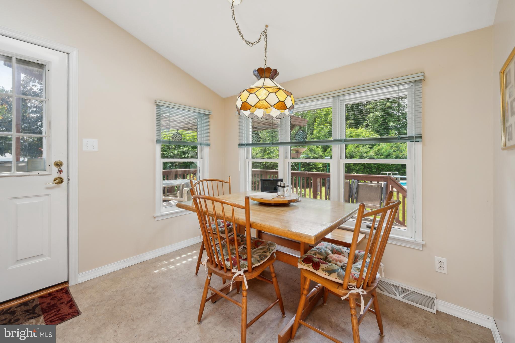 2 Tomahawk Drive Marlton, NJ 08053 - Photo 14 of 26 a view of a dining room with furniture wooden floor and chandelier