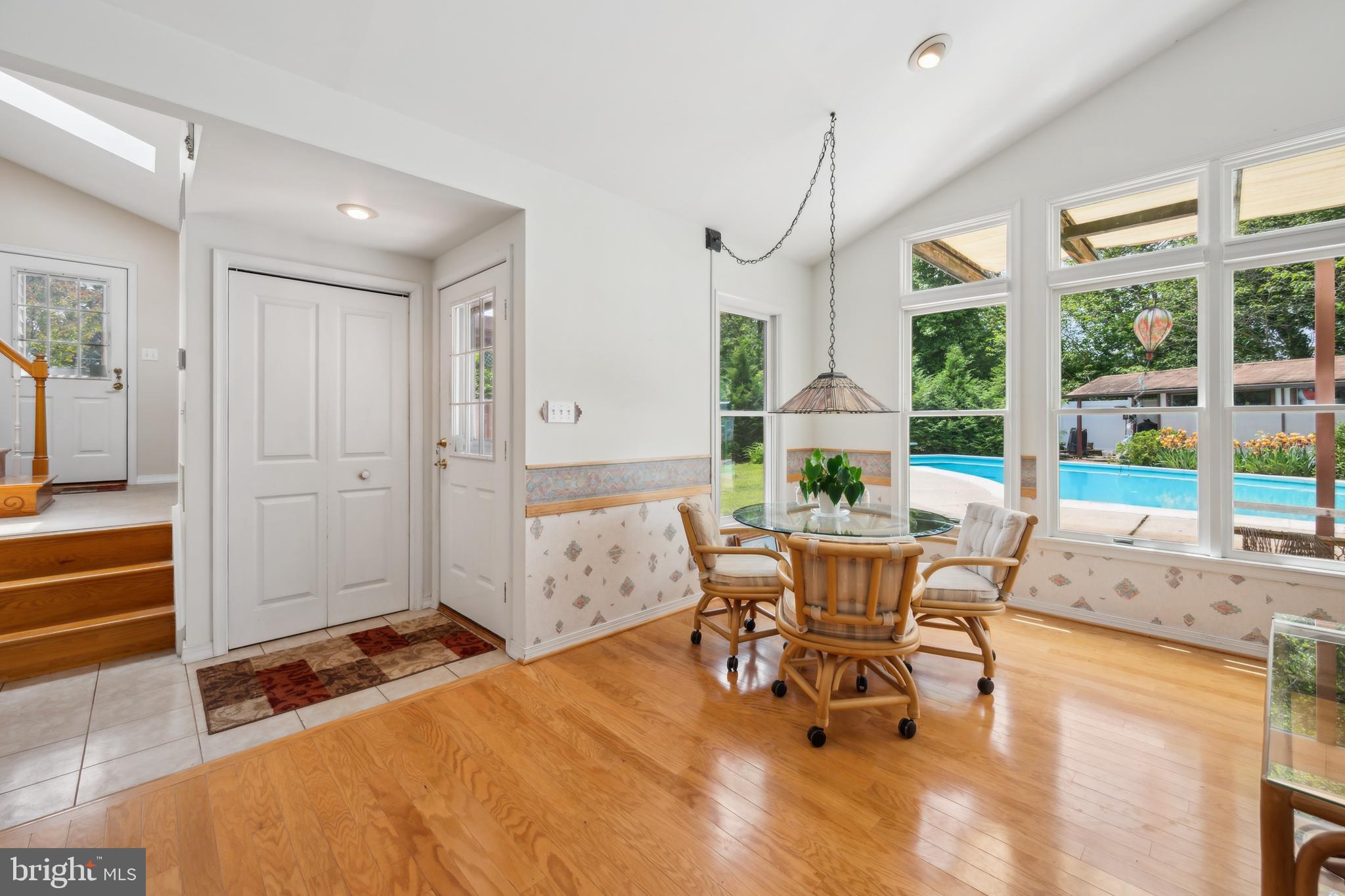 2 Tomahawk Drive Marlton, NJ 08053 - Photo 15 of 26 a living room with furniture a large window and wooden floor
