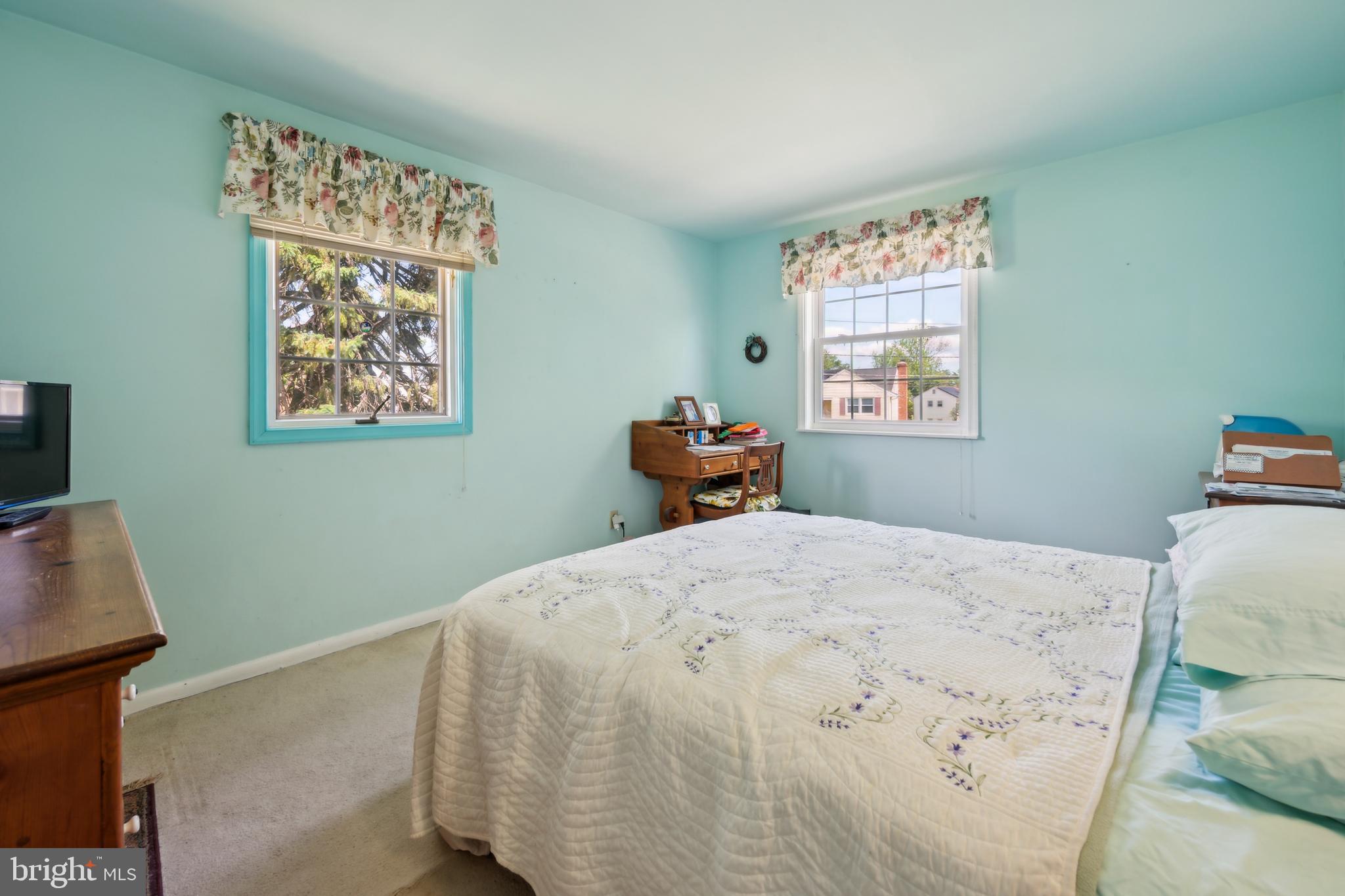 2 Tomahawk Drive Marlton, NJ 08053 - Photo 19 of 26 a bedroom with a bed and wooden floor