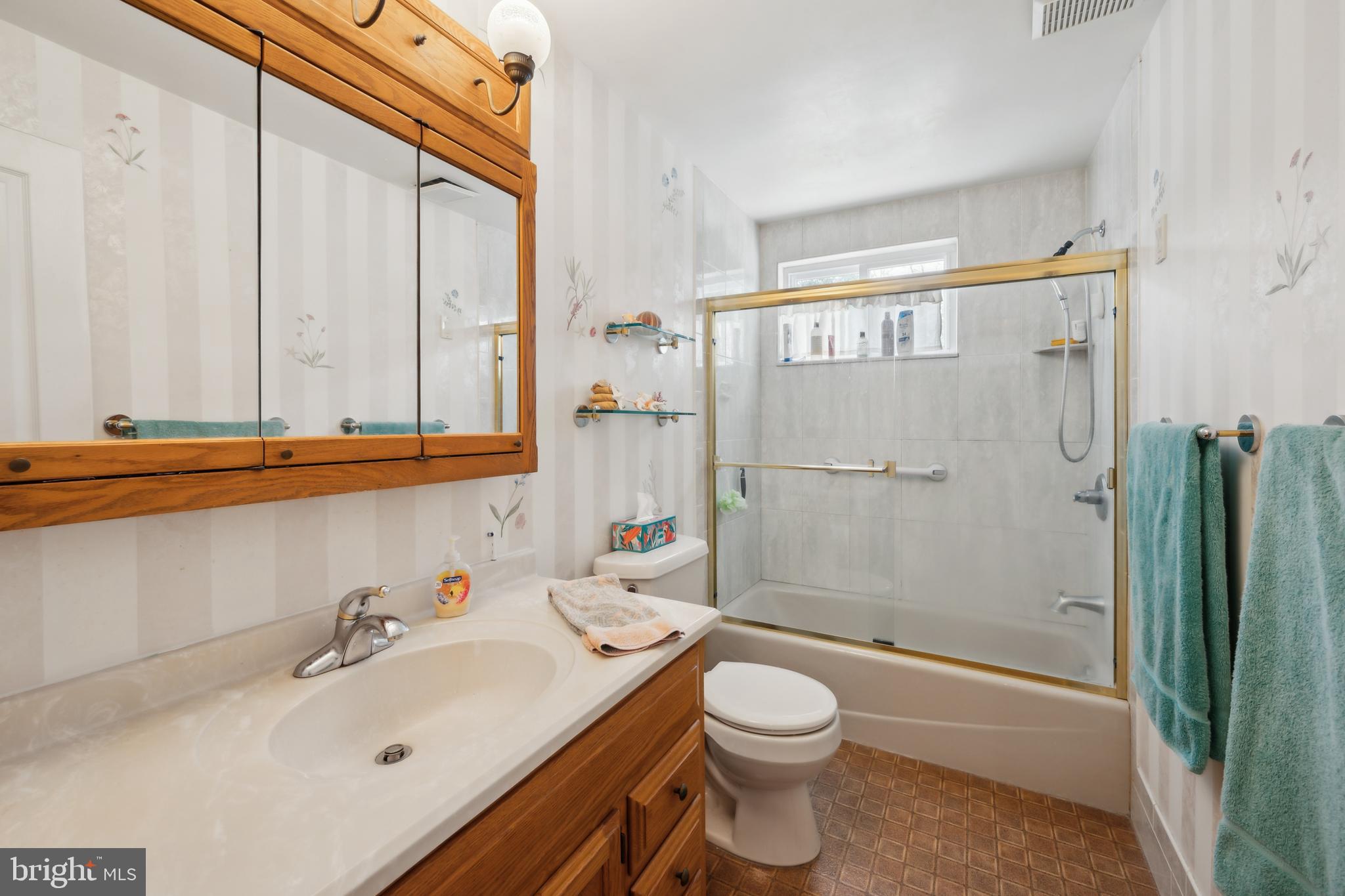 2 Tomahawk Drive Marlton, NJ 08053 - Photo 21 of 26 a bathroom with a sink a toilet and shower