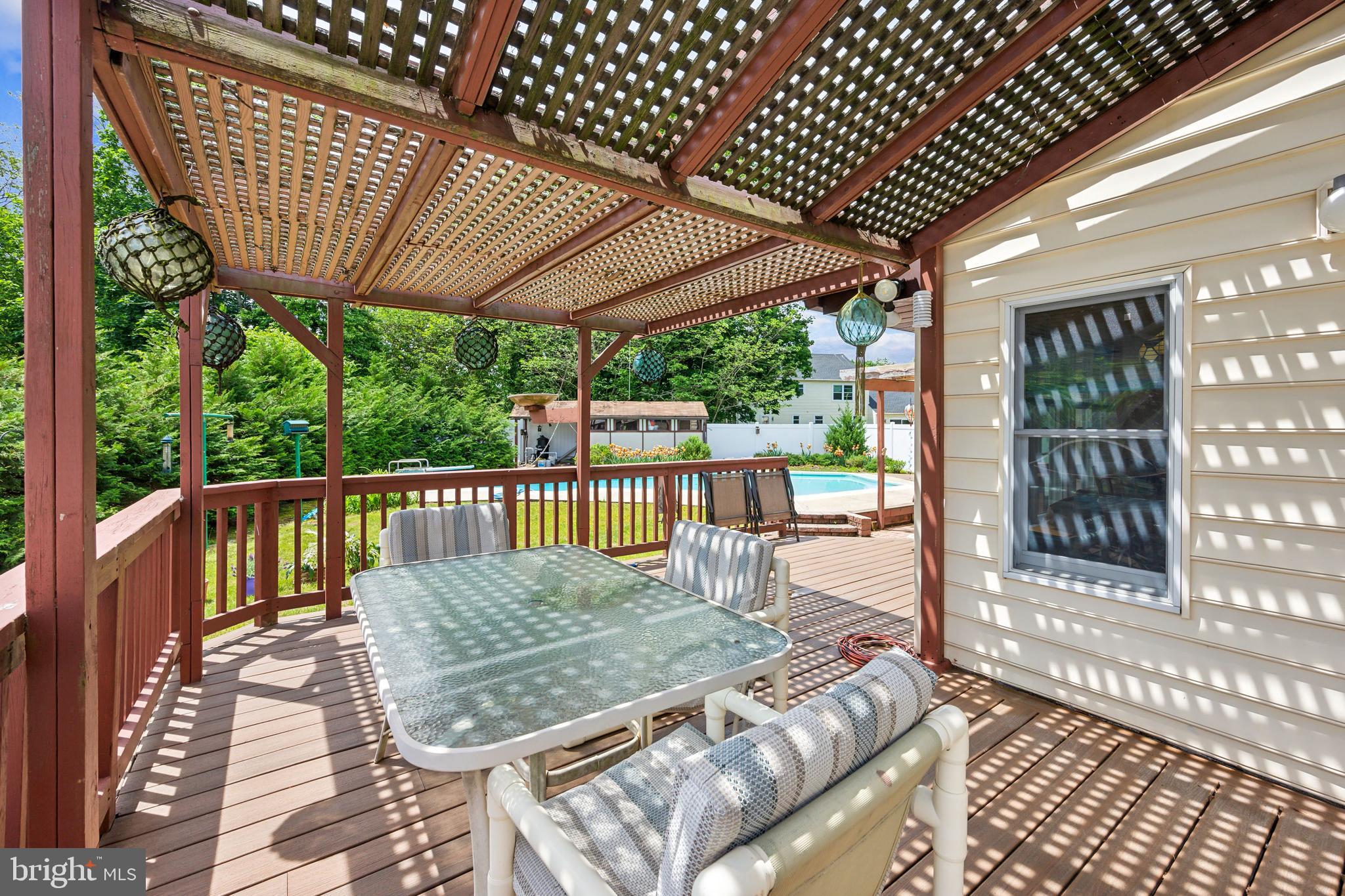 2 Tomahawk Drive Marlton, NJ 08053 - Photo 23 of 26 a view of balcony with wooden floor and outdoor seating