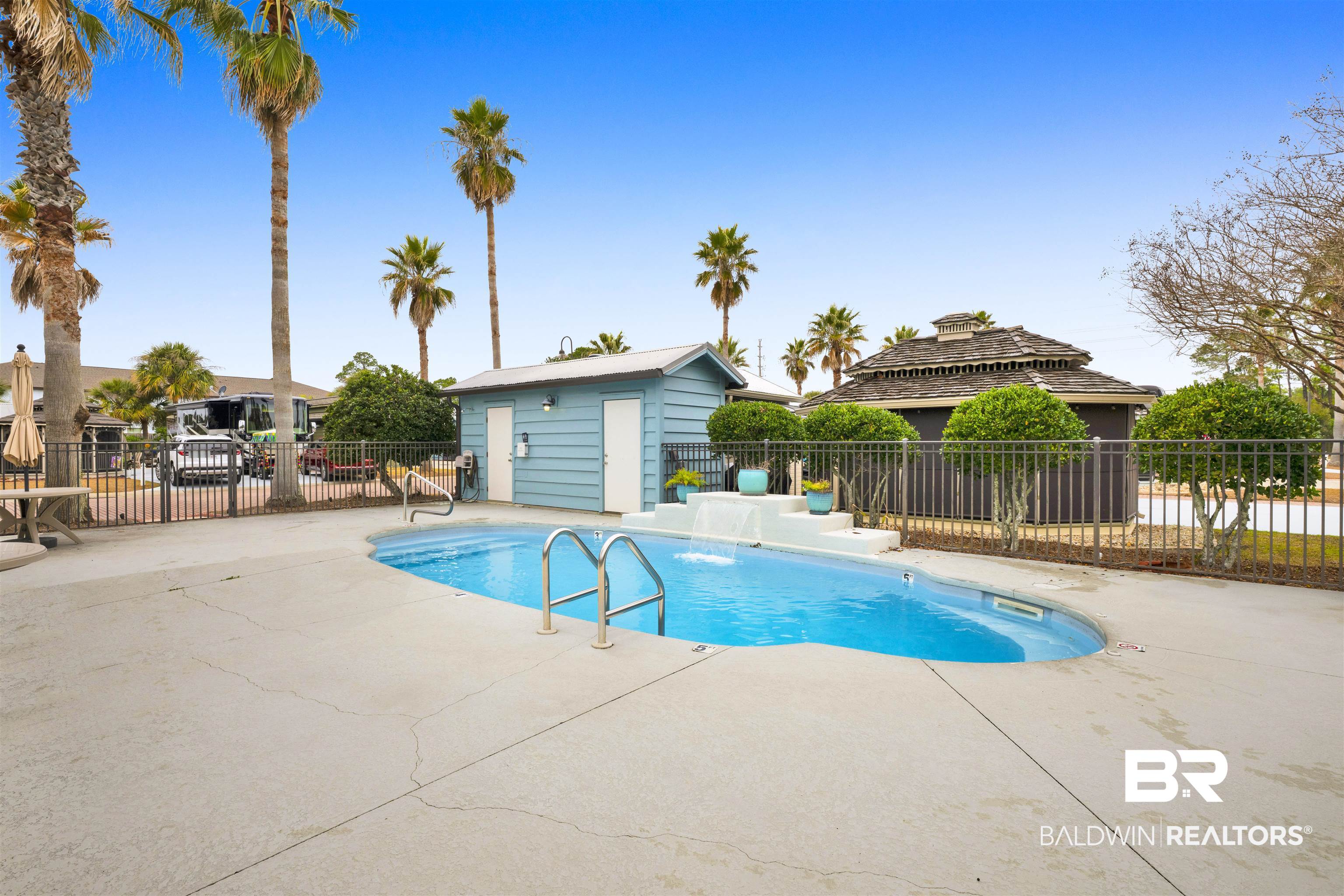 4650 Griffith Marina Road, Unit LOT 24 Orange Beach, AL 36561 - Photo 20 of 34 View of swimming pool with patio surround