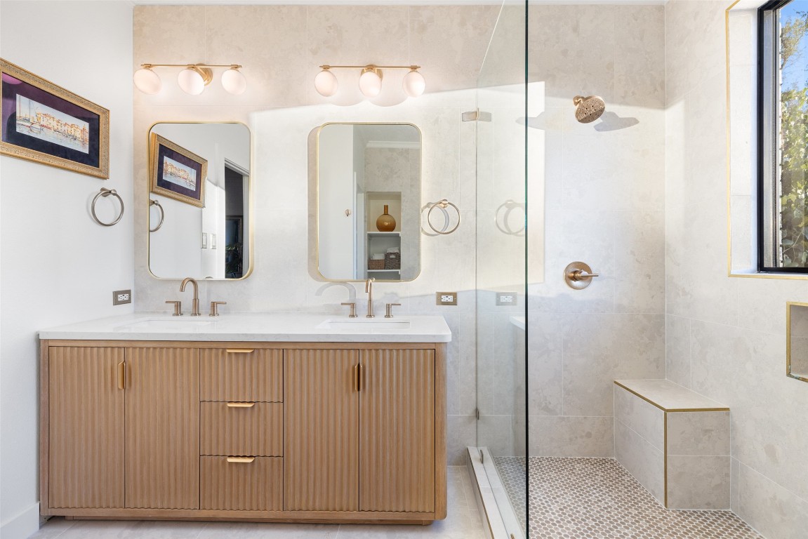 120 Oak Springs Drive Dripping Springs, TX 78620 - Photo 11 of 35 a bathroom with a double vanity sink mirror and shower