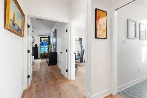 a kitchen with stainless steel appliances a stove a refrigerator and a refrigerator