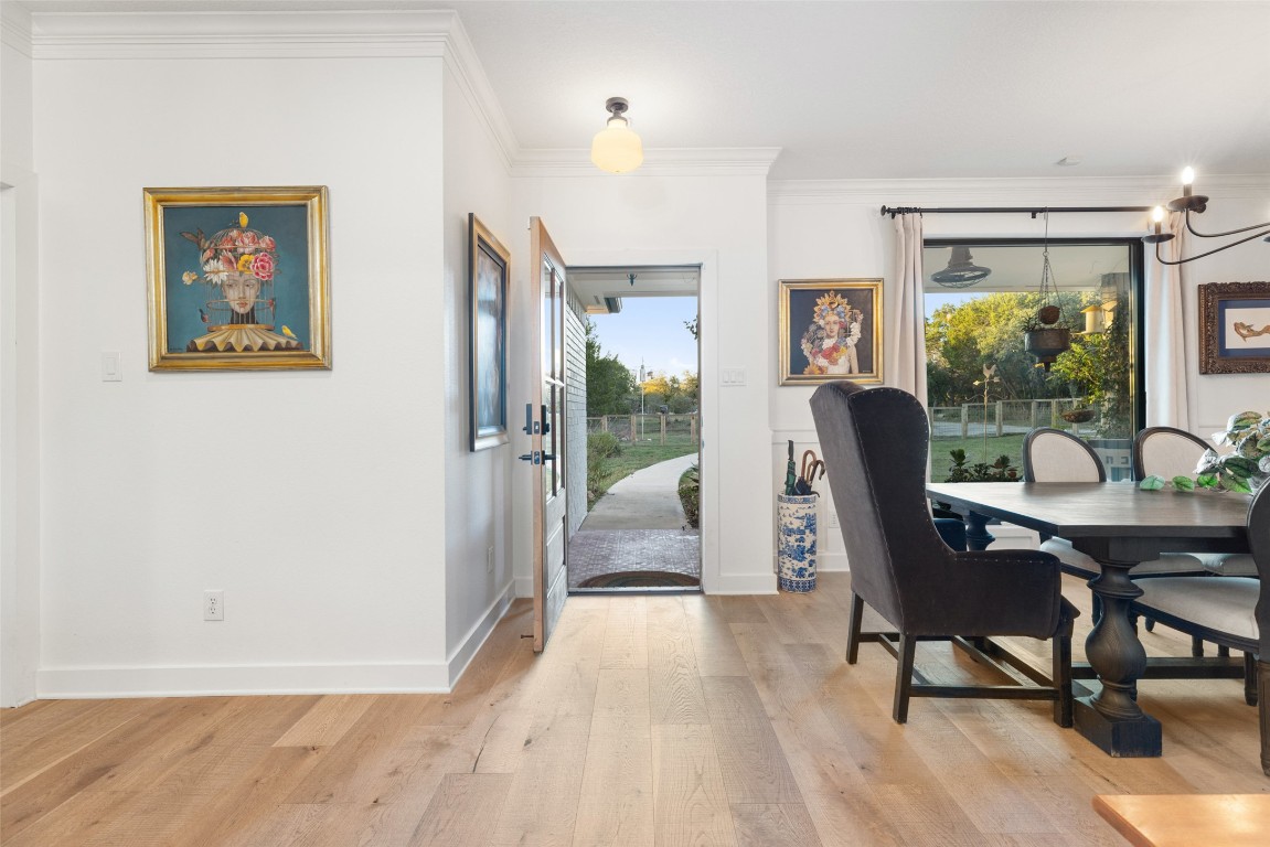 120 Oak Springs Drive Dripping Springs, TX 78620 - Photo 19 of 35 a view of a livingroom with furniture and a potted plant