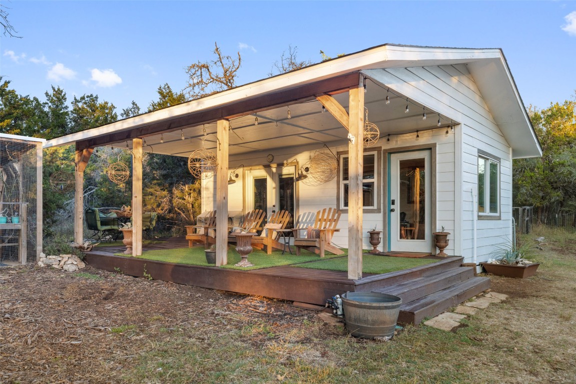 120 Oak Springs Drive Dripping Springs, TX 78620 - Photo 27 of 35 a front view of a house with porch