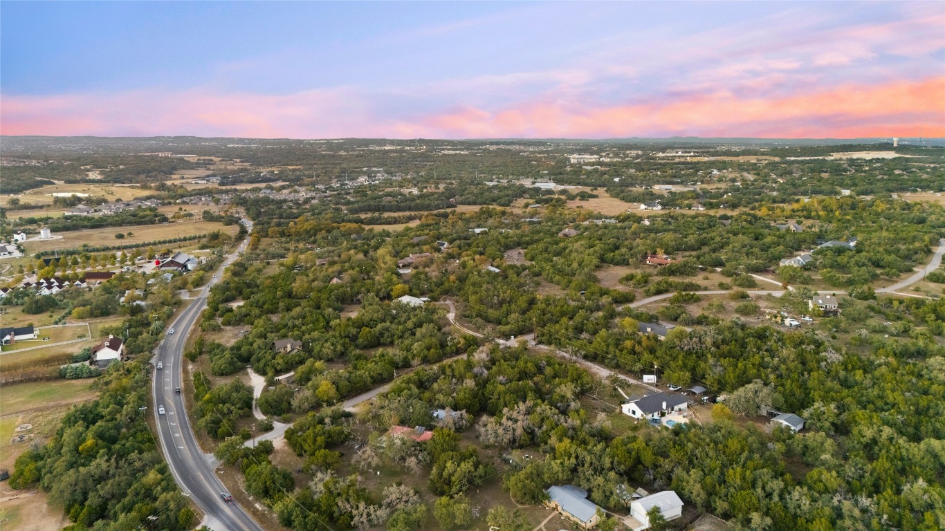 120 Oak Springs Drive Dripping Springs, TX 78620 - Photo 4 of 35 Aerial view at dusk