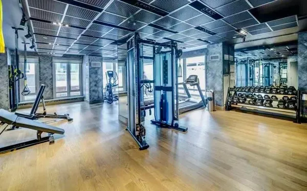 a view of a room with gym equipment