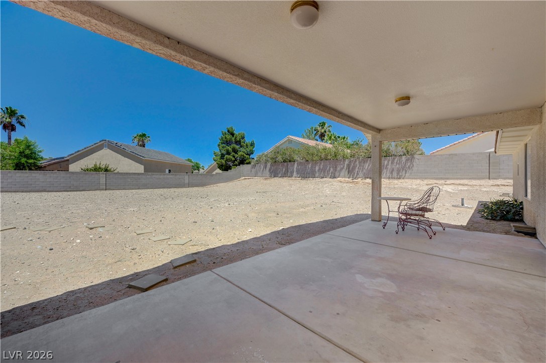 1272 Liston Avenue Logandale, NV 89021 - Photo 42 of 61 An inviting covered patio opens to an undeveloped private yard, perfect for personalized landscaping.