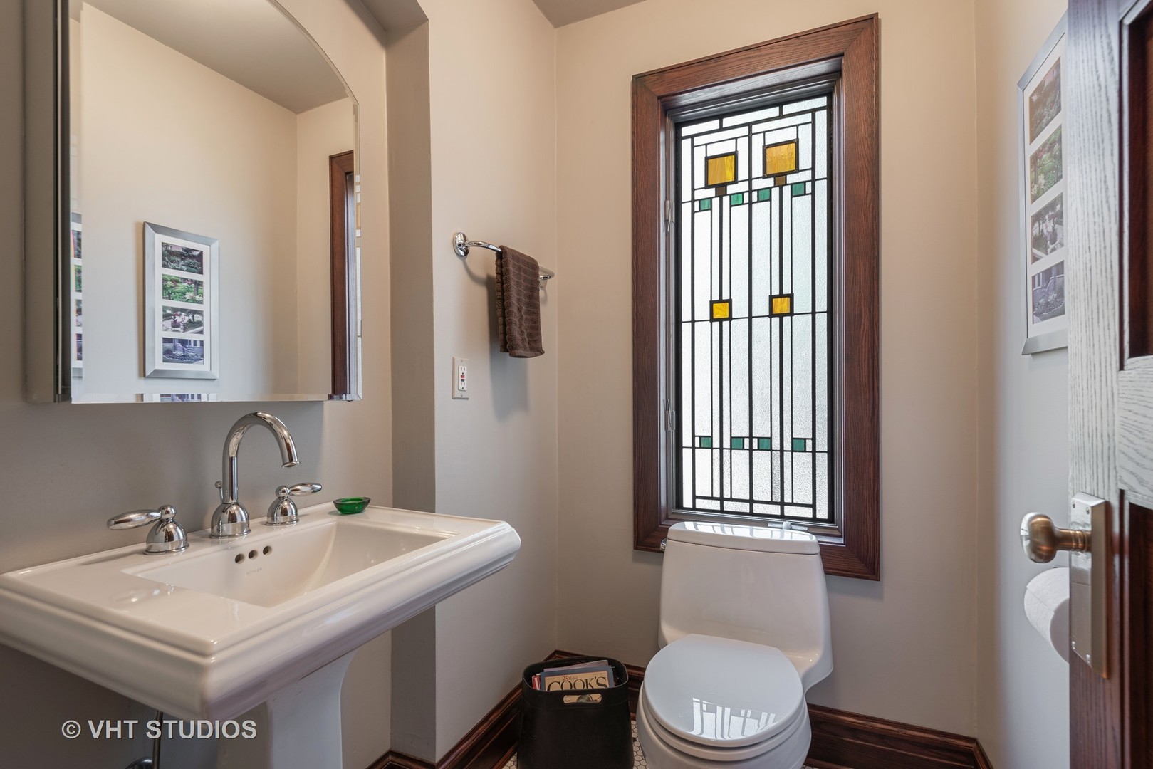 7406 North Sheridan Road Chicago, IL 60626 - Photo 13 of 37 a bathroom with a sink a toilet and shower