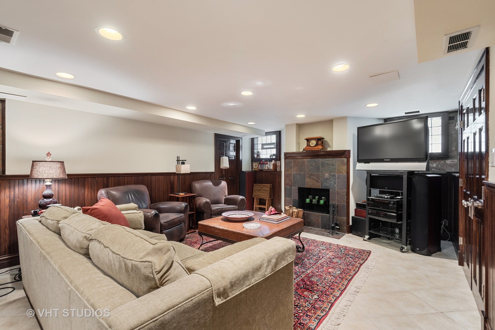 7406 North Sheridan Road Chicago, IL 60626 - Photo 26 of 37 a living room with fireplace furniture and a fireplace