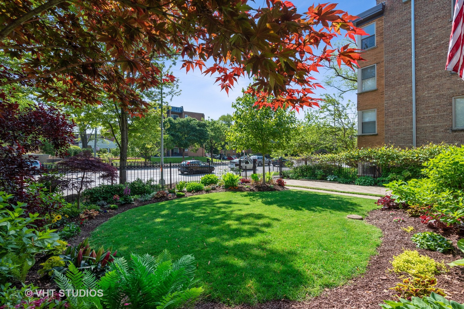 7406 North Sheridan Road Chicago, IL 60626 - Photo 33 of 37 a view of yard with swimming pool and green space