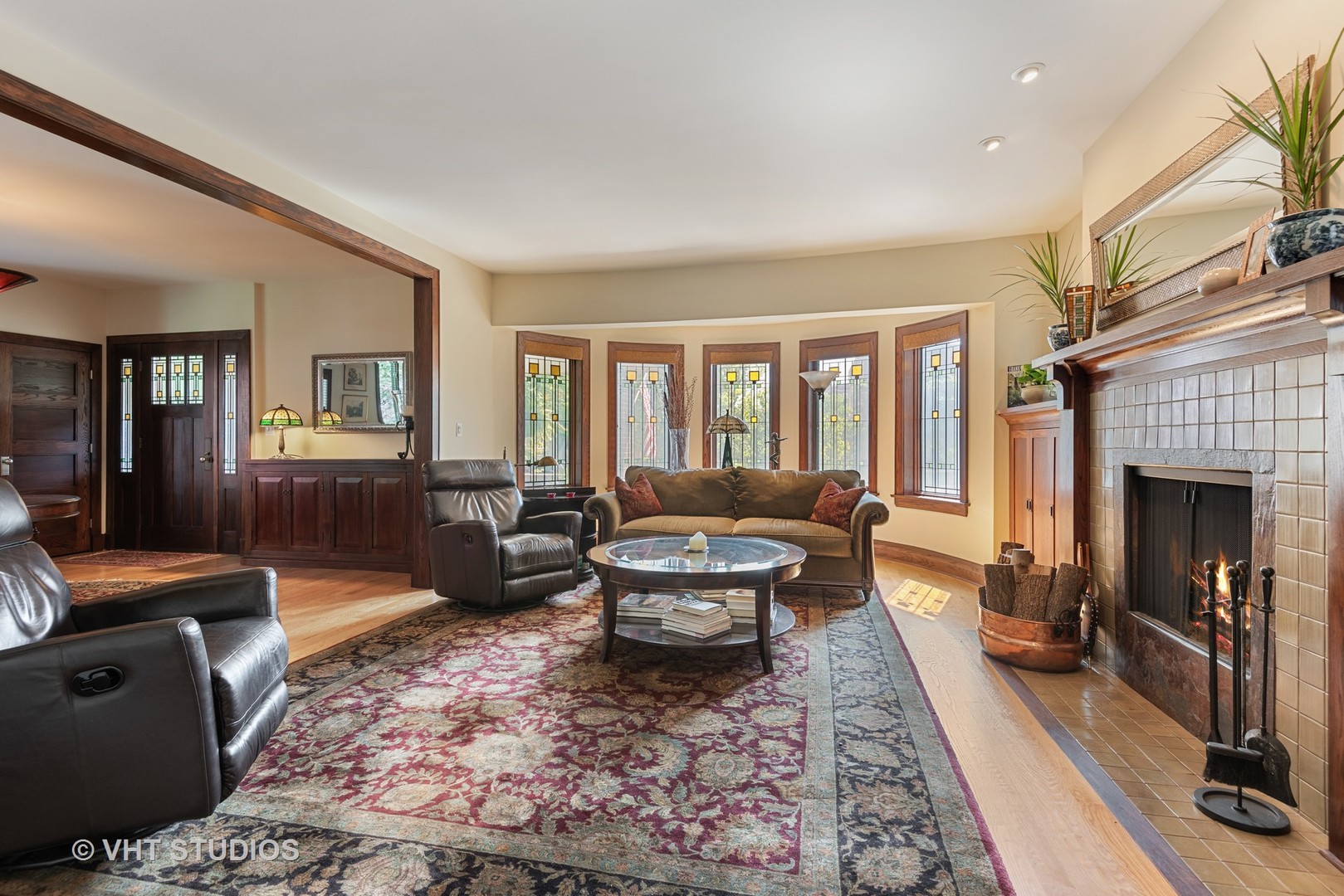 7406 North Sheridan Road Chicago, IL 60626 - Photo 6 of 37 a living room with furniture and a fireplace
