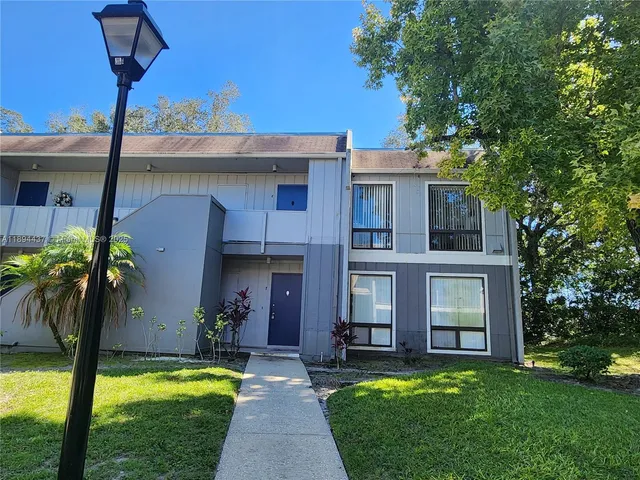 a view of a house with a swimming pool