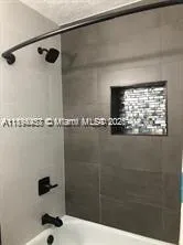 a close view of a shower in bathroom