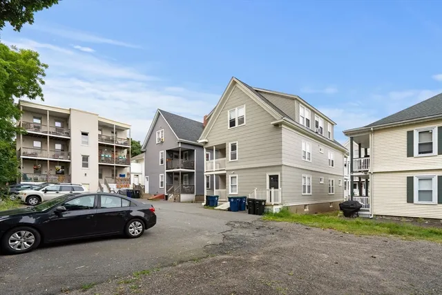 a car parked in front of a house