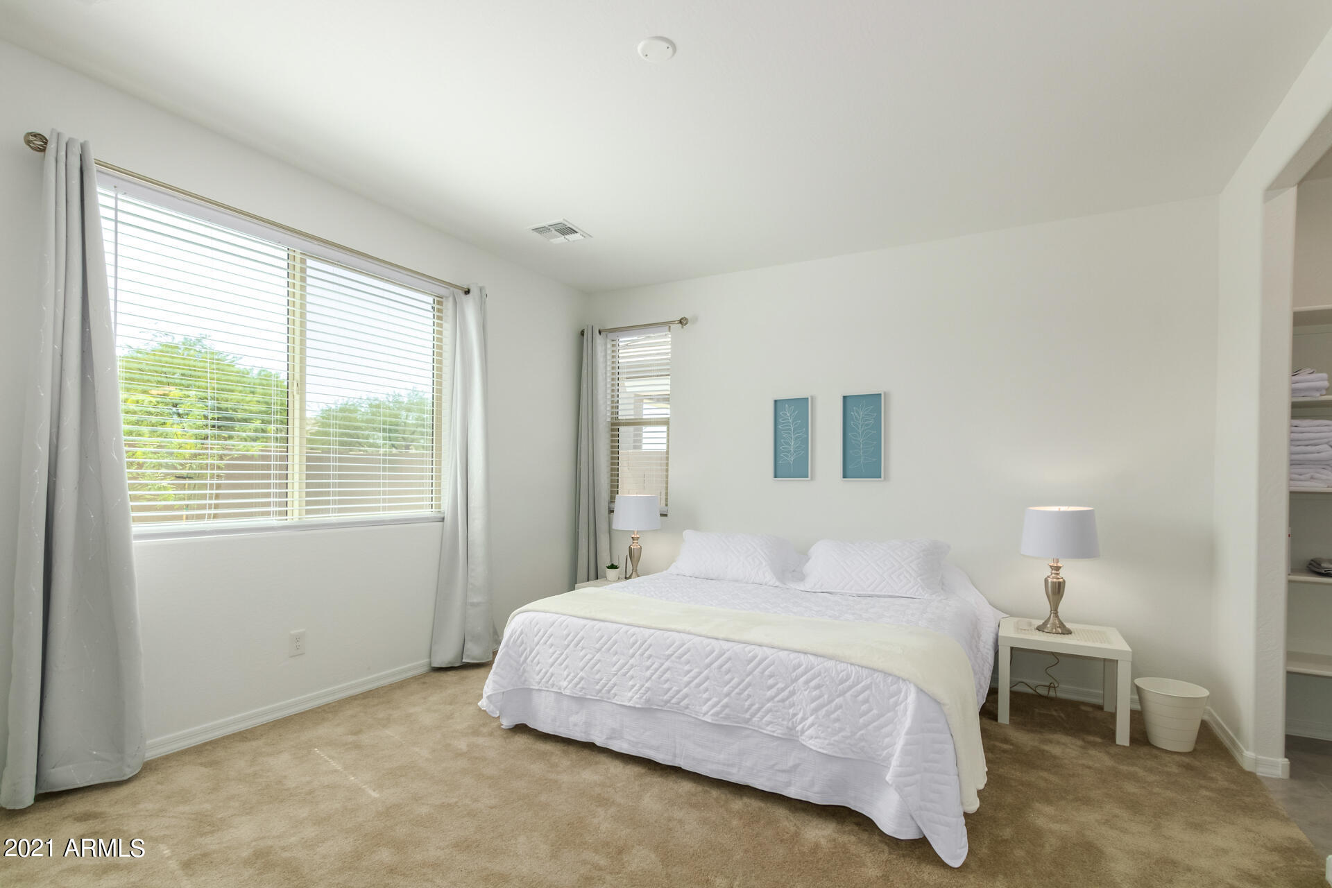 1507 South Honeysuckle Lane Gilbert, AZ 85296 - Photo 16 of 32 a bedroom with a bed and a window