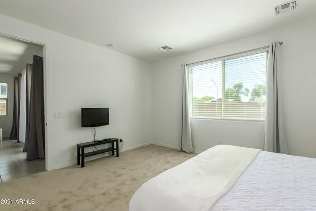 a bathroom with a double vanity sink mirror and double