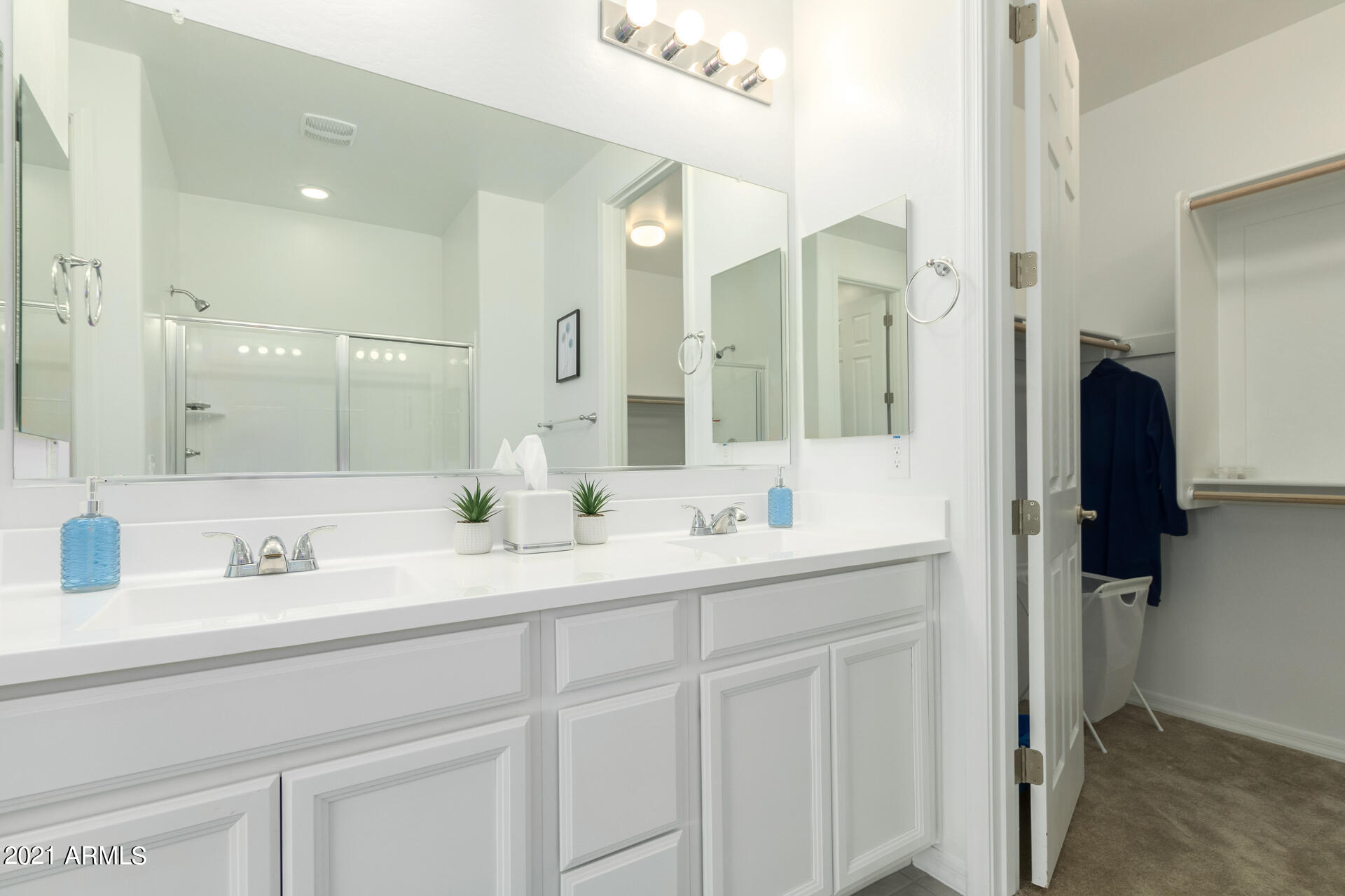 1507 South Honeysuckle Lane Gilbert, AZ 85296 - Photo 20 of 32 a bathroom with a double vanity sink mirror and double
